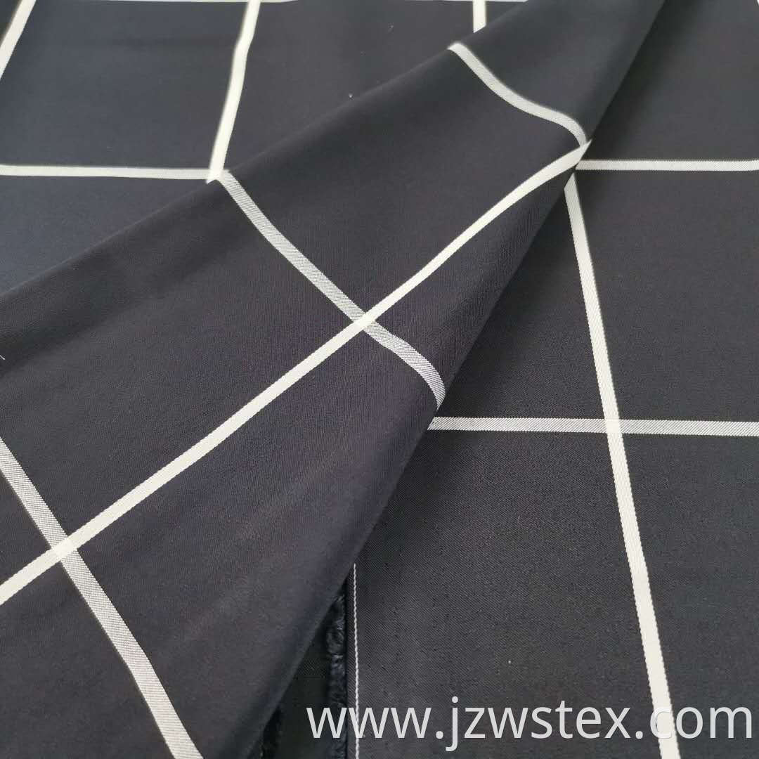 Satin Elasticity in All Directions Black background and white stripe in Yarn-dyed fabrics